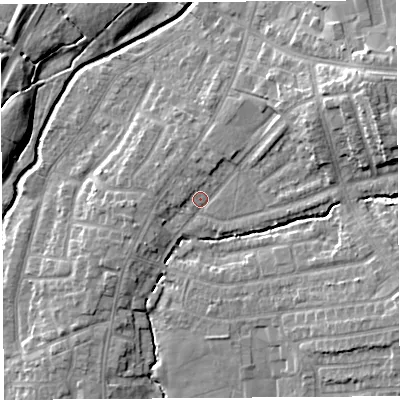 Shaded relief map of the ground around PR251GS, computed from Environment Agency LiDAR. The ground here sits at about 21 m above sea level and falls 15 m across the surrounding 800 m. Surface water reaching this point runs off ground lying to the north-east, 6.7 m higher.