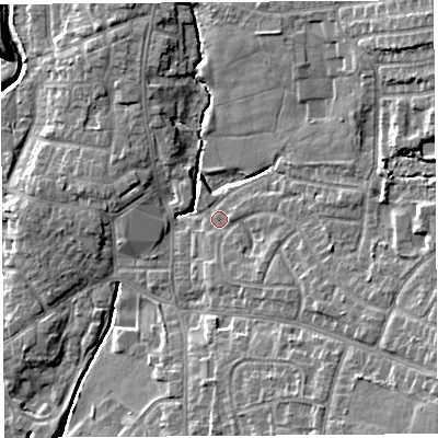 Shaded relief map of the ground around PR251HX, computed from Environment Agency LiDAR. The ground here sits at about 18 m above sea level and falls 12 m across the surrounding 800 m. Surface water reaching this point runs off ground lying to the east-north-east, 6.3 m higher.