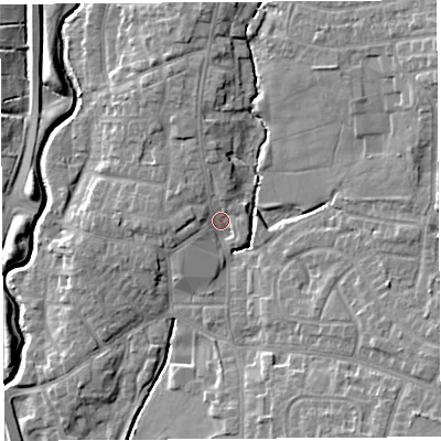 Shaded relief map of the ground around PR251UN, computed from Environment Agency LiDAR. The ground here sits at about 18 m above sea level and falls 12 m across the surrounding 800 m. Surface water reaching this point runs off ground lying to the north, 3.7 m higher.