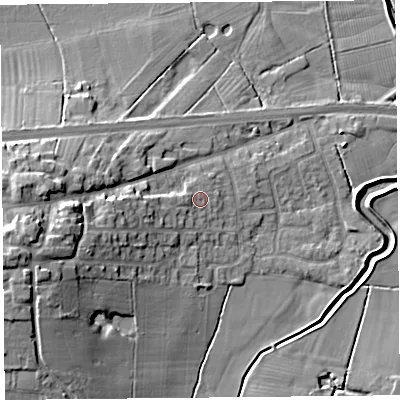 Shaded relief map of the ground around PR30XT, computed from Environment Agency LiDAR. The ground here sits at about 9 m above sea level and falls 15 m across the surrounding 800 m. Surface water reaching this point runs off ground lying to the west, 1.1 m higher.