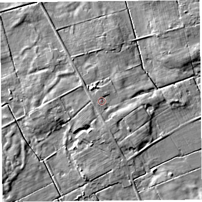 Shaded relief map of the ground around PR36BN, computed from Environment Agency LiDAR. The ground here sits at about 9 m above sea level and falls 7 m across the surrounding 800 m. Surface water reaching this point runs off ground lying to the north, 0.9 m higher.