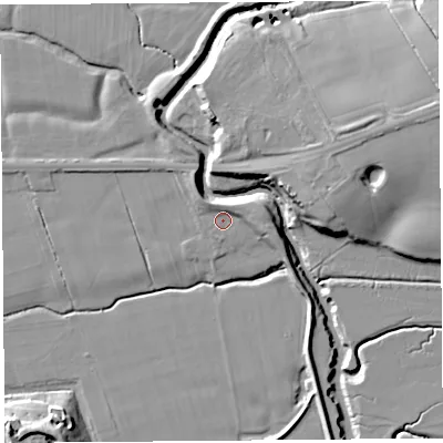 Shaded relief map of the ground around PR40XD, computed from Environment Agency LiDAR. The ground here sits at about 6 m above sea level and falls 14 m across the surrounding 800 m. Surface water reaching this point runs off ground lying to the east, 3.2 m higher.