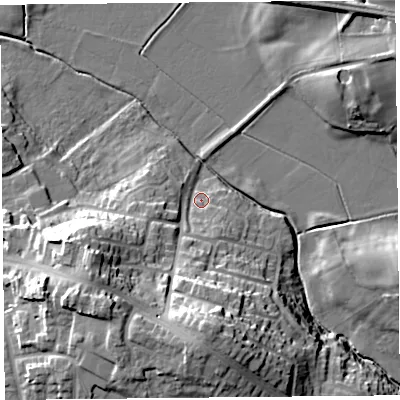 Shaded relief map of the ground around PR42YH, computed from Environment Agency LiDAR. The ground here sits at about 13 m above sea level and falls 25 m across the surrounding 800 m. Surface water reaching this point runs off ground lying to the south, 21.8 m higher.