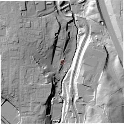 Shaded relief map of the ground around PR60QQ, computed from Environment Agency LiDAR. The ground here sits at about 85 m above sea level and falls 35 m across the surrounding 800 m. Surface water reaching this point runs off ground lying to the north-west, 18.8 m higher.
