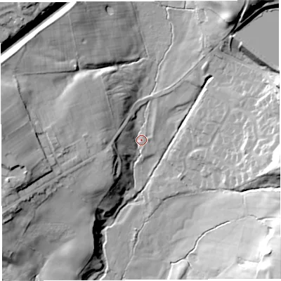 Shaded relief map of the ground around PR69BL, computed from Environment Agency LiDAR. The ground here sits at about 99 m above sea level and falls 36 m across the surrounding 800 m. Surface water reaching this point runs off ground lying to the west, 24.6 m higher.
