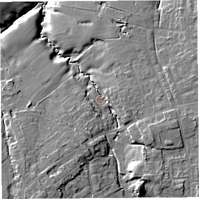 Shaded relief map of the ground around PR75BT, computed from Environment Agency LiDAR. The ground here sits at about 69 m above sea level and falls 18 m across the surrounding 800 m. Surface water reaching this point runs off ground lying to the south-east, 8.2 m higher.