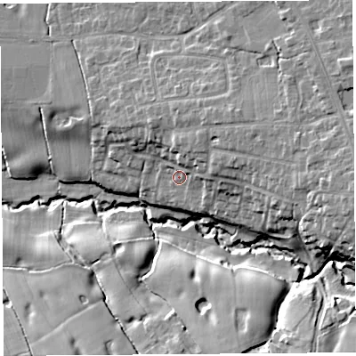 Shaded relief map of the ground around PR75RQ, computed from Environment Agency LiDAR. The ground here sits at about 24 m above sea level and falls 17 m across the surrounding 800 m. Surface water reaching this point runs off ground lying to the north-north-east, 3.8 m higher.
