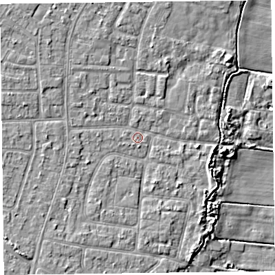 Shaded relief map of the ground around PR83RS, computed from Environment Agency LiDAR. The ground here sits at about 7 m above sea level and falls 8 m across the surrounding 800 m. Surface water reaching this point runs off ground lying to the north-west, 2.9 m higher.