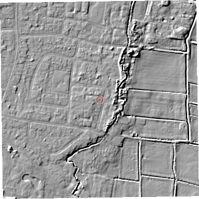 Shaded relief map of the ground around PR83RY, computed from Environment Agency LiDAR. The ground here sits at about 6 m above sea level and falls 9 m across the surrounding 800 m. Surface water reaching this point runs off ground lying to the north-west, 3.0 m higher.