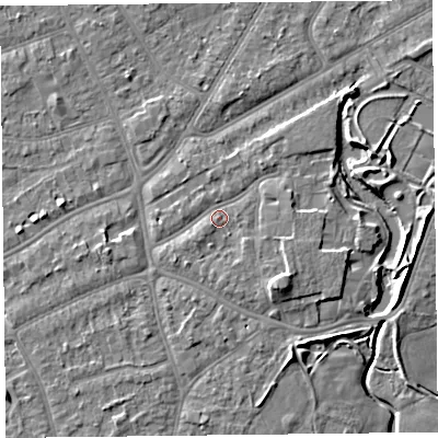 Shaded relief map of the ground around PR97LU, computed from Environment Agency LiDAR. The ground here sits at about 7 m above sea level and falls 7 m across the surrounding 800 m. Surface water reaching this point runs off ground lying to the south, 1.6 m higher.