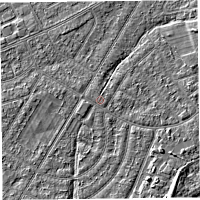 Shaded relief map of the ground around PR98QS, computed from Environment Agency LiDAR. The ground here sits at about 5 m above sea level and falls 7 m across the surrounding 800 m. The ground contributing surface water to this point lies to the west-north-west.