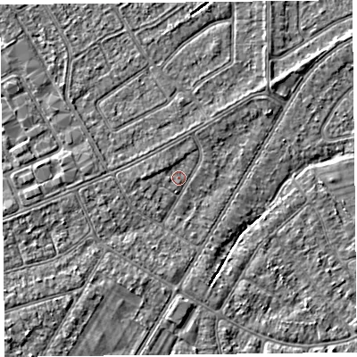 Shaded relief map of the ground around PR99FB, computed from Environment Agency LiDAR. The ground here sits at about 5 m above sea level and falls 3 m across the surrounding 800 m. Surface water reaching this point runs off ground lying to the south-west, 1.3 m higher.