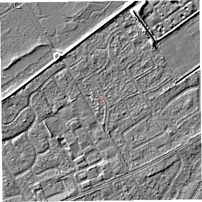Shaded relief map of the ground around PR99FU, computed from Environment Agency LiDAR. The ground here sits at about 5 m above sea level and falls 7 m across the surrounding 800 m. Surface water reaching this point runs off ground lying to the south, 1.1 m higher.