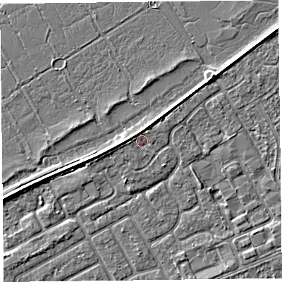 Shaded relief map of the ground around PR99GD, computed from Environment Agency LiDAR. The ground here sits at about 5 m above sea level and falls 3 m across the surrounding 800 m. Surface water reaching this point runs off ground lying to the west, 1.8 m higher.