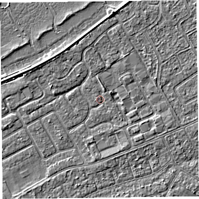 Shaded relief map of the ground around PR99GL, computed from Environment Agency LiDAR. The ground here sits at about 5 m above sea level and falls 3 m across the surrounding 800 m. Surface water reaching this point runs off ground lying to the north-north-east, 1.1 m higher.