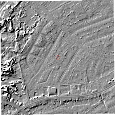 Shaded relief map of the ground around PR99PT, computed from Environment Agency LiDAR. The ground here sits at about 6 m above sea level and falls 7 m across the surrounding 800 m. Surface water reaching this point runs off ground lying to the north, 0.6 m higher.