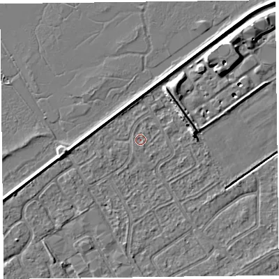 Shaded relief map of the ground around PR99RT, computed from Environment Agency LiDAR. The ground here sits at about 5 m above sea level and falls 8 m across the surrounding 800 m. Surface water reaching this point runs off ground lying to the south-east, 0.5 m higher.