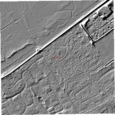 Shaded relief map of the ground around PR99RU, computed from Environment Agency LiDAR. The ground here sits at about 5 m above sea level and falls 8 m across the surrounding 800 m. Surface water reaching this point runs off ground lying to the north-west, 2.6 m higher.