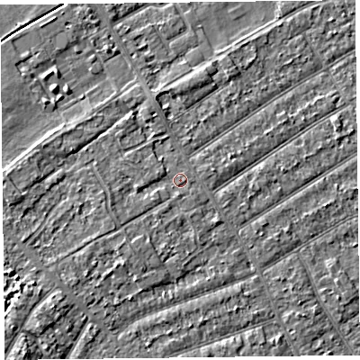 Shaded relief map of the ground around PR99TA, computed from Environment Agency LiDAR. The ground here sits at about 6 m above sea level and falls 4 m across the surrounding 800 m. Surface water reaching this point runs off ground lying to the south, 0.8 m higher.
