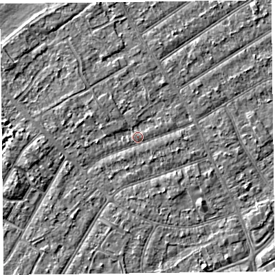 Shaded relief map of the ground around PR99TB, computed from Environment Agency LiDAR. The ground here sits at about 6 m above sea level and falls 3 m across the surrounding 800 m. Surface water reaching this point runs off ground lying to the west-south-west, 2.1 m higher.