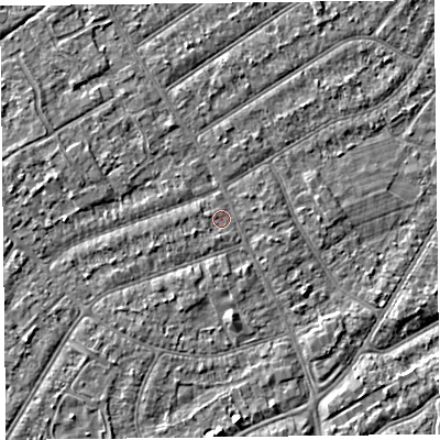 Shaded relief map of the ground around PR99TD, computed from Environment Agency LiDAR. The ground here sits at about 6 m above sea level and falls 3 m across the surrounding 800 m. Surface water reaching this point runs off ground lying to the south, 0.6 m higher.