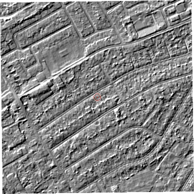 Shaded relief map of the ground around PR99TZ, computed from Environment Agency LiDAR. The ground here sits at about 5 m above sea level and falls 2 m across the surrounding 800 m. Surface water reaching this point runs off ground lying to the south-west, 1.3 m higher.