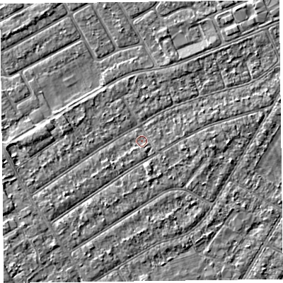 Shaded relief map of the ground around PR99UA, computed from Environment Agency LiDAR. The ground here sits at about 5 m above sea level and falls 2 m across the surrounding 800 m. Surface water reaching this point runs off ground lying to the south-west, 1.4 m higher.