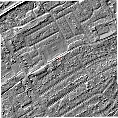 Shaded relief map of the ground around PR99UF, computed from Environment Agency LiDAR. The ground here sits at about 5 m above sea level and falls 3 m across the surrounding 800 m. Surface water reaching this point runs off ground lying to the south, 0.6 m higher.