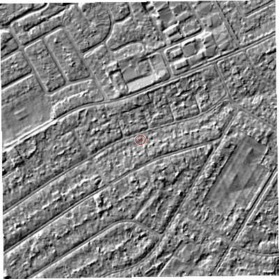 Shaded relief map of the ground around PR99UN, computed from Environment Agency LiDAR. The ground here sits at about 5 m above sea level and falls 2 m across the surrounding 800 m. Surface water reaching this point runs off ground lying to the south-south-west, 1.3 m higher.