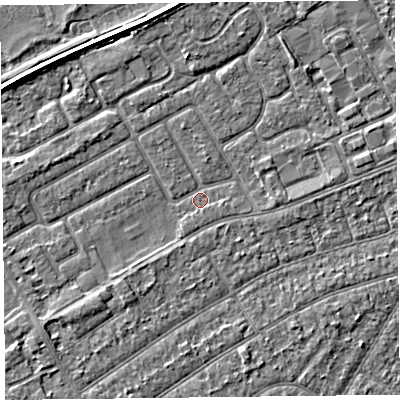 Shaded relief map of the ground around PR99XG, computed from Environment Agency LiDAR. The ground here sits at about 5 m above sea level and falls 3 m across the surrounding 800 m. Surface water reaching this point runs off ground lying to the south-west, 1.6 m higher.
