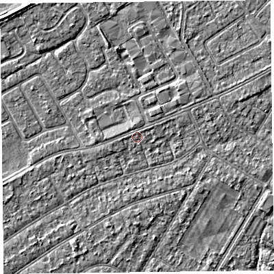 Shaded relief map of the ground around PR99XL, computed from Environment Agency LiDAR. The ground here sits at about 5 m above sea level and falls 3 m across the surrounding 800 m. The ground contributing surface water to this point lies to the north.