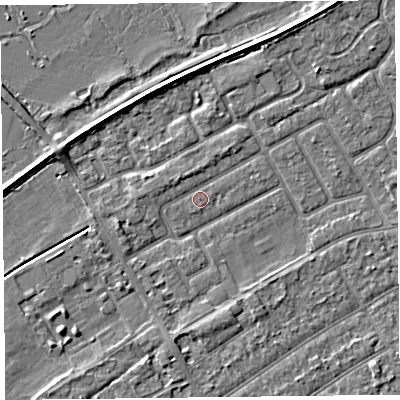 Shaded relief map of the ground around PR99XW, computed from Environment Agency LiDAR. The ground here sits at about 5 m above sea level and falls 3 m across the surrounding 800 m. Surface water reaching this point runs off ground lying to the north-north-west, 0.9 m higher.