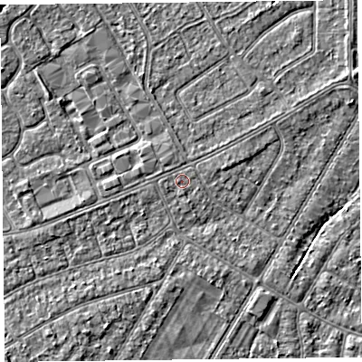 Shaded relief map of the ground around PR99XY, computed from Environment Agency LiDAR. The ground here sits at about 5 m above sea level and falls 3 m across the surrounding 800 m. The ground contributing surface water to this point lies to the west-south-west.