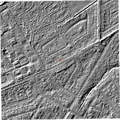 Shaded relief map of the ground around PR99XZ, computed from Environment Agency LiDAR. The ground here sits at about 5 m above sea level and falls 3 m across the surrounding 800 m. The ground contributing surface water to this point lies to the south-south-east.