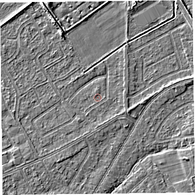 Shaded relief map of the ground around PR99YT, computed from Environment Agency LiDAR. The ground here sits at about 5 m above sea level and falls 7 m across the surrounding 800 m. The ground contributing surface water to this point lies to the south-south-west.