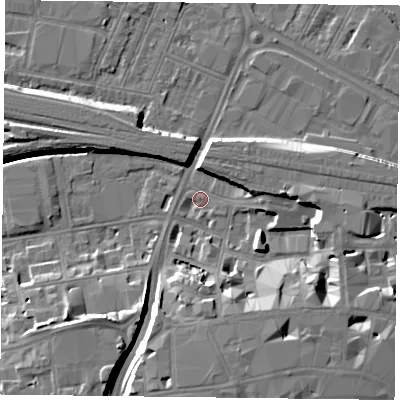 Shaded relief map of the ground around RG11HN, computed from Environment Agency LiDAR. The ground here sits at about 38 m above sea level and falls 10 m across the surrounding 800 m. Surface water reaching this point runs off ground lying to the south-south-east, 8.8 m higher.