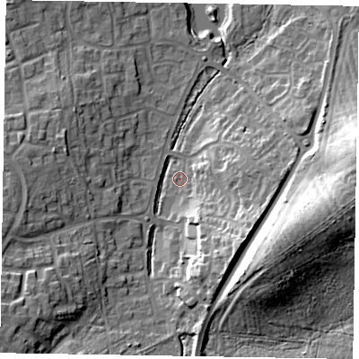 Shaded relief map of the ground around RG120UA, computed from Environment Agency LiDAR. The ground here sits at about 76 m above sea level and falls 23 m across the surrounding 800 m. Surface water reaching this point runs off ground lying to the east-south-east, 12.2 m higher.
