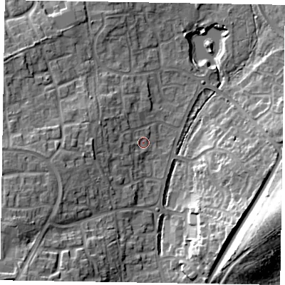 Shaded relief map of the ground around RG120UR, computed from Environment Agency LiDAR. The ground here sits at about 77 m above sea level and falls 23 m across the surrounding 800 m. Surface water reaching this point runs off ground lying to the west, 7.0 m higher.
