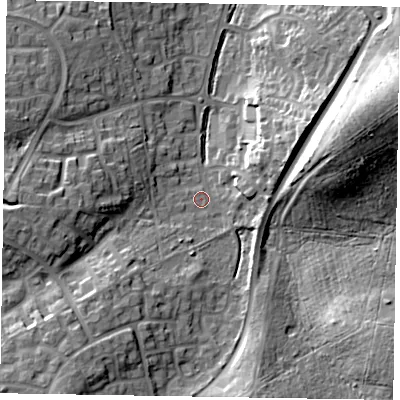 Shaded relief map of the ground around RG120XS, computed from Environment Agency LiDAR. The ground here sits at about 77 m above sea level and falls 20 m across the surrounding 800 m. Surface water reaching this point runs off ground lying to the south-west, 11.7 m higher.
