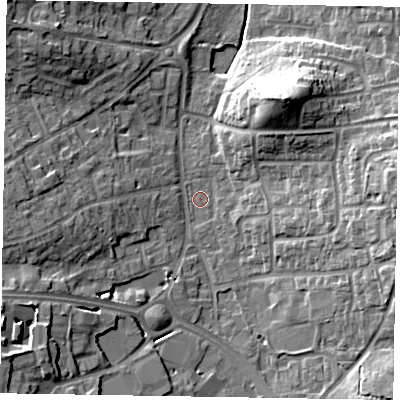 Shaded relief map of the ground around RG122NH, computed from Environment Agency LiDAR. The ground here sits at about 64 m above sea level and falls 18 m across the surrounding 800 m. Surface water reaching this point runs off ground lying to the east, 13.0 m higher.