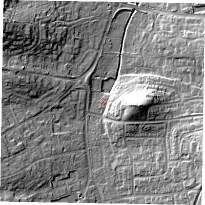 Shaded relief map of the ground around RG122PR, computed from Environment Agency LiDAR. The ground here sits at about 65 m above sea level and falls 22 m across the surrounding 800 m. Surface water reaching this point runs off ground lying to the east, 10.9 m higher.
