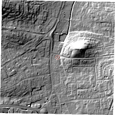 Shaded relief map of the ground around RG122PS, computed from Environment Agency LiDAR. The ground here sits at about 64 m above sea level and falls 22 m across the surrounding 800 m. Surface water reaching this point runs off ground lying to the east-south-east, 14.5 m higher.