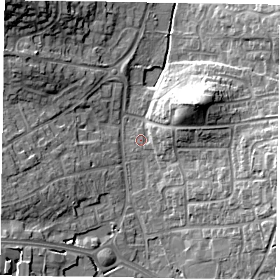 Shaded relief map of the ground around RG122PT, computed from Environment Agency LiDAR. The ground here sits at about 65 m above sea level and falls 22 m across the surrounding 800 m. Surface water reaching this point runs off ground lying to the east-north-east, 5.5 m higher.
