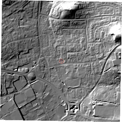 Shaded relief map of the ground around RG122RB, computed from Environment Agency LiDAR. The ground here sits at about 65 m above sea level and falls 32 m across the surrounding 800 m. Surface water reaching this point runs off ground lying to the east-north-east, 28.4 m higher.