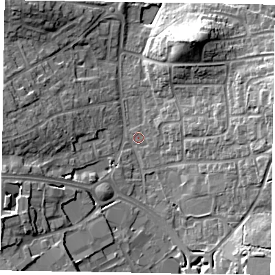 Shaded relief map of the ground around RG122TA, computed from Environment Agency LiDAR. The ground here sits at about 65 m above sea level and falls 18 m across the surrounding 800 m. Surface water reaching this point runs off ground lying to the west-south-west, 12.8 m higher.