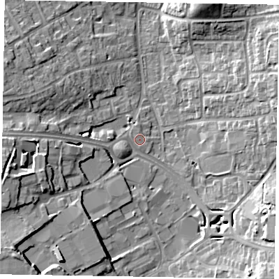 Shaded relief map of the ground around RG122UR, computed from Environment Agency LiDAR. The ground here sits at about 67 m above sea level and falls 15 m across the surrounding 800 m. Surface water reaching this point runs off ground lying to the west-north-west, 1.3 m higher.