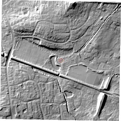Shaded relief map of the ground around RG129QS, computed from Environment Agency LiDAR. The ground here sits at about 70 m above sea level and falls 20 m across the surrounding 800 m. Surface water reaching this point runs off ground lying to the north-east, 15.7 m higher.