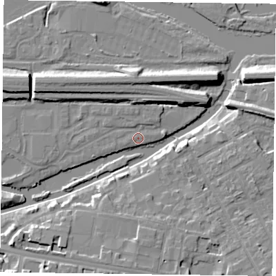 Shaded relief map of the ground around RG13GH, computed from Environment Agency LiDAR. The ground here sits at about 38 m above sea level and falls 10 m across the surrounding 800 m. Surface water reaching this point runs off ground lying to the north-east, 5.1 m higher.