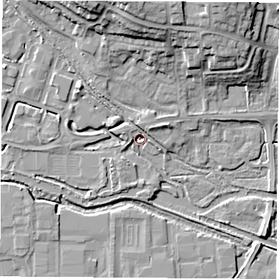 Shaded relief map of the ground around RG142BY, computed from Environment Agency LiDAR. The ground here sits at about 69 m above sea level and falls 19 m across the surrounding 800 m. Surface water reaching this point runs off ground lying to the north, 19.4 m higher.