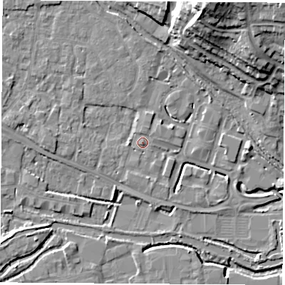 Shaded relief map of the ground around RG142FU, computed from Environment Agency LiDAR. The ground here sits at about 74 m above sea level and falls 24 m across the surrounding 800 m. Surface water reaching this point runs off ground lying to the west, 2.7 m higher.